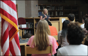 New York Times Best Selling Author Ellen Hopkins speaks to students in the media center on September 4, 2014.