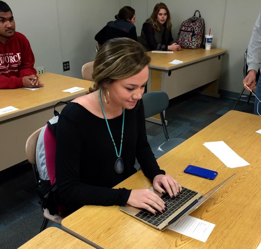 Senior, Lauren Talley, brings her own laptop to work during class.