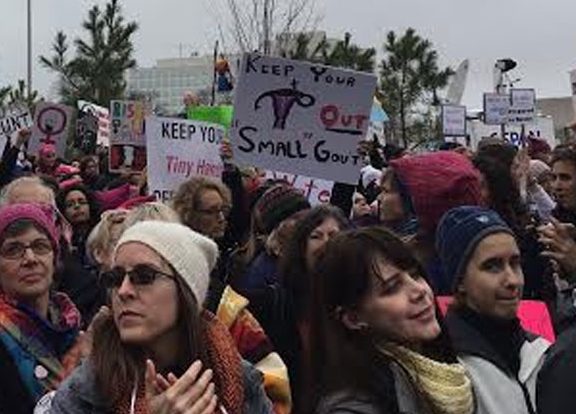 The Womens March on Washington was filled with signs taking on phrases popularized by the Trump campaign. 