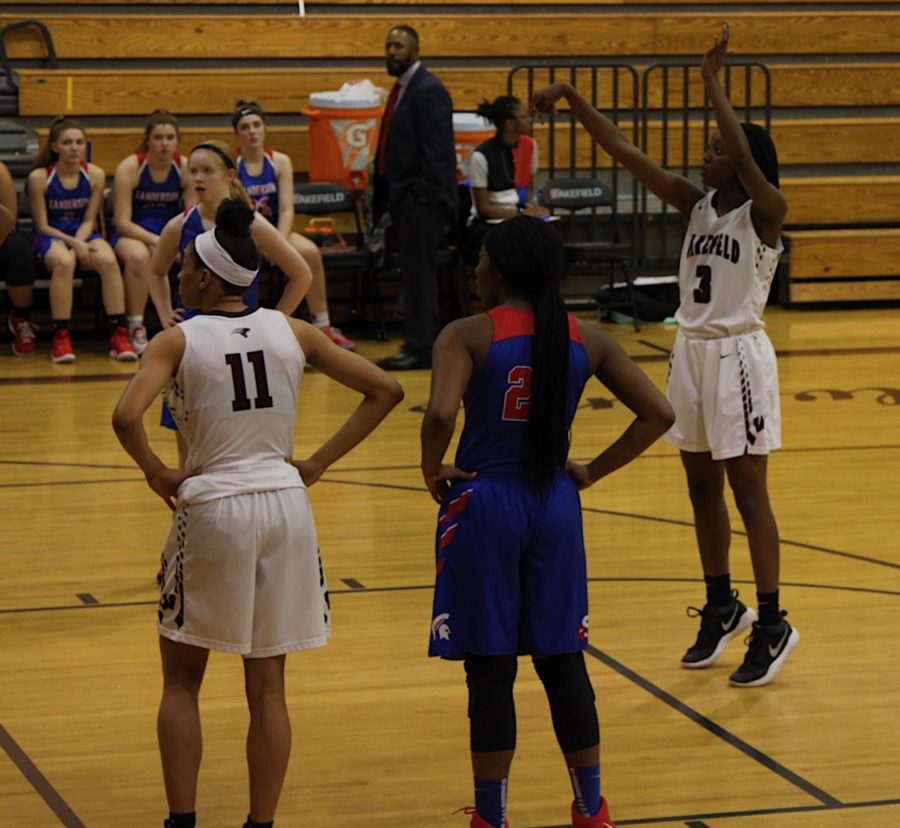 Elise Williams shoots a free throw in hopes of scoring for the team.