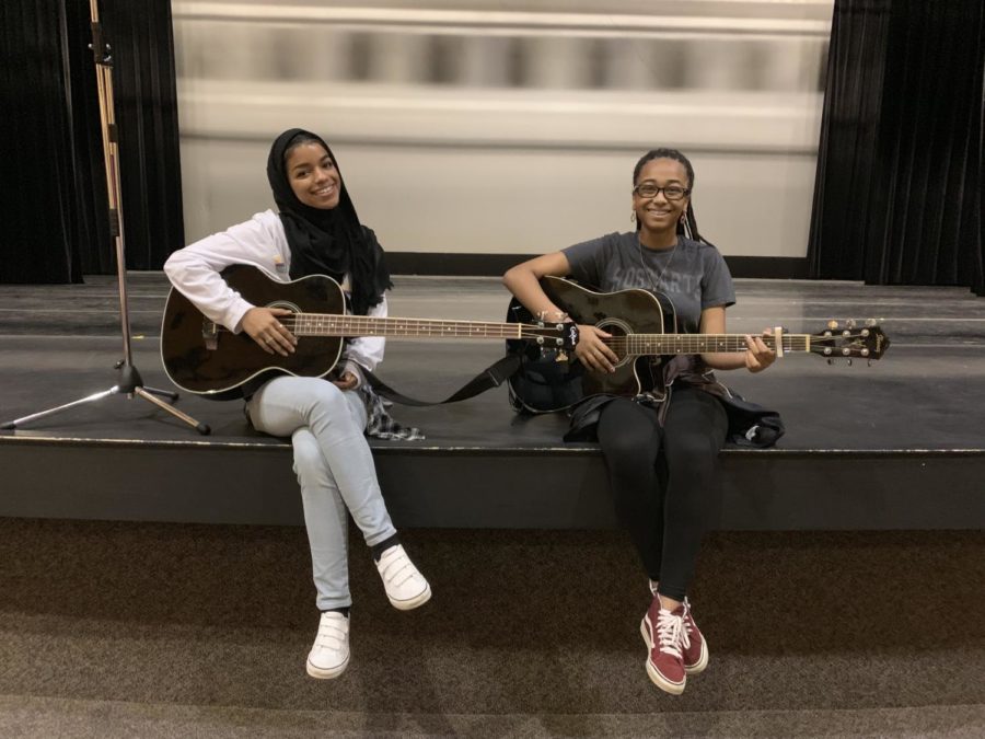 Seniors, Brianna Williams (right) and Hubs Muhammad (left) practice before the senior talent show.