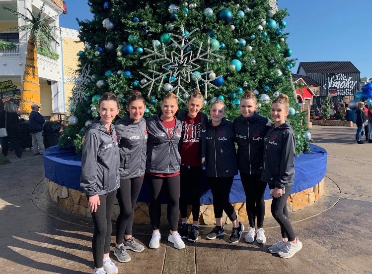 Dance students pose for a photo in their Wakefield jackets.