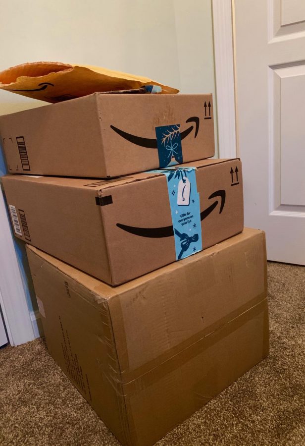 Amazon boxes stack up in place of what used to be shopping bags from retail stores.