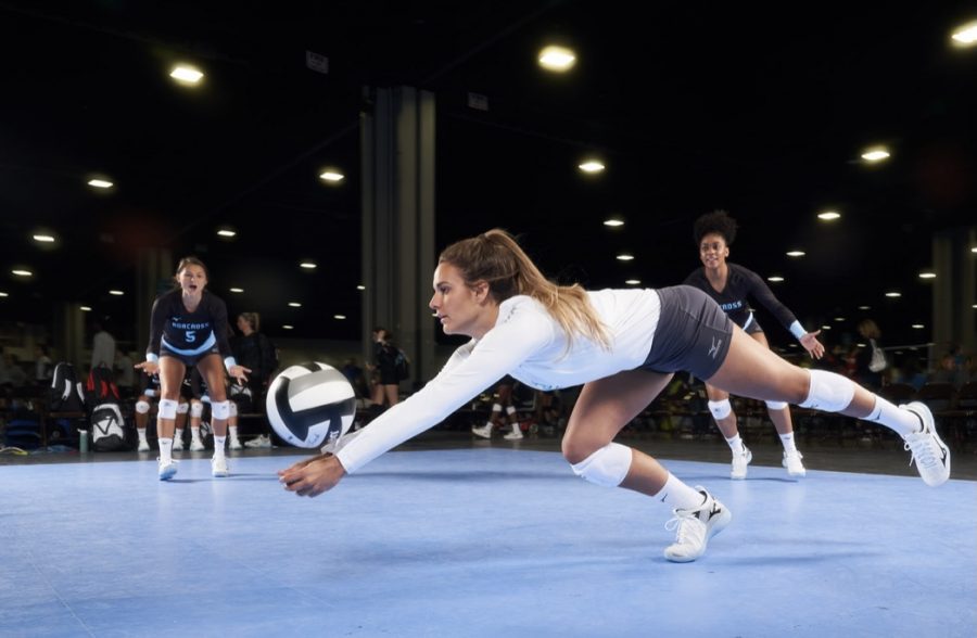 Volleyball players during a match. 