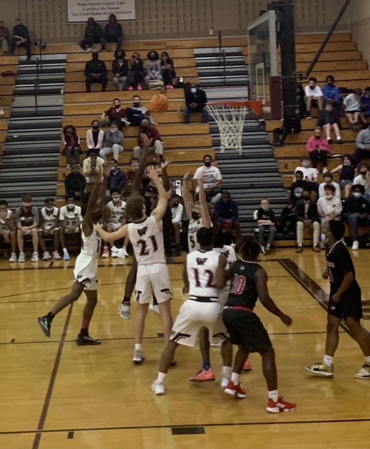 The Wakefield High school basketball team attempts a basket vs Franklinton high.
