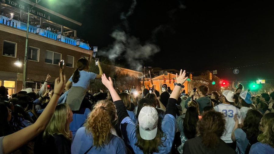 Students of The University of North Carolina at Chapel Hill join together after the mens basketball team beats Duke University in the final four game.