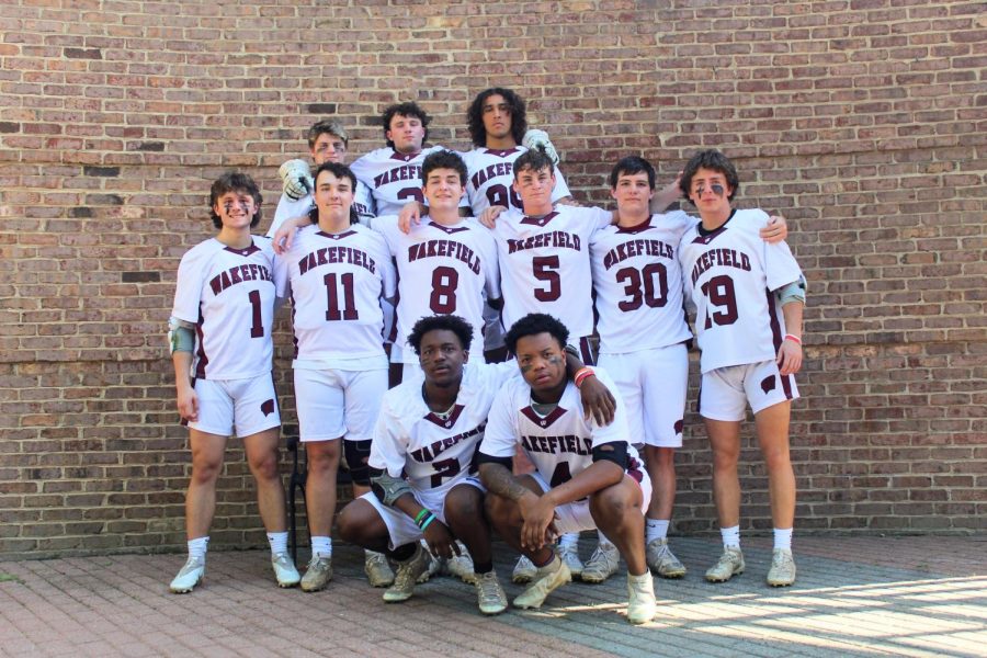 The seniors of the mens lacrosse team uplift and encourage the underclassmen around them.