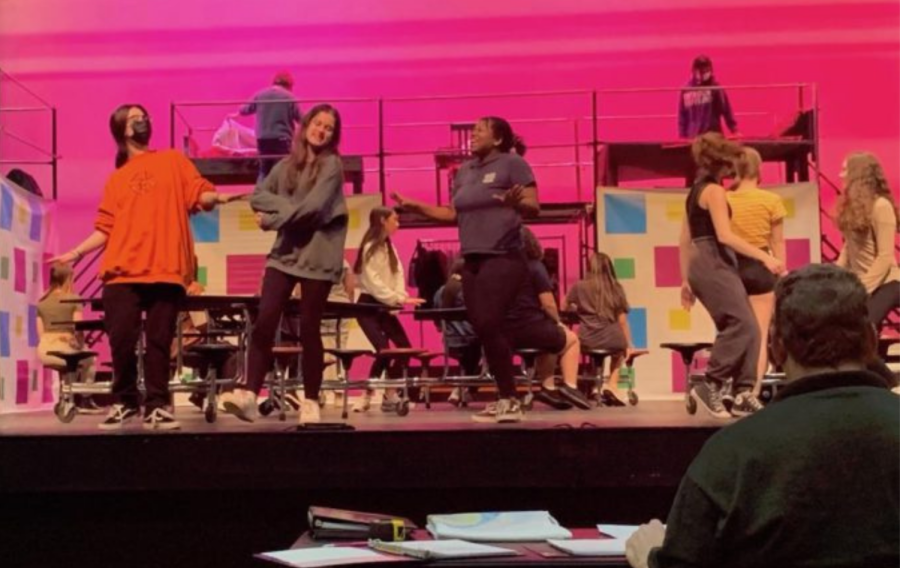 Cast members in Emma: A Pop Musical rehearse for their upcoming shows. 
