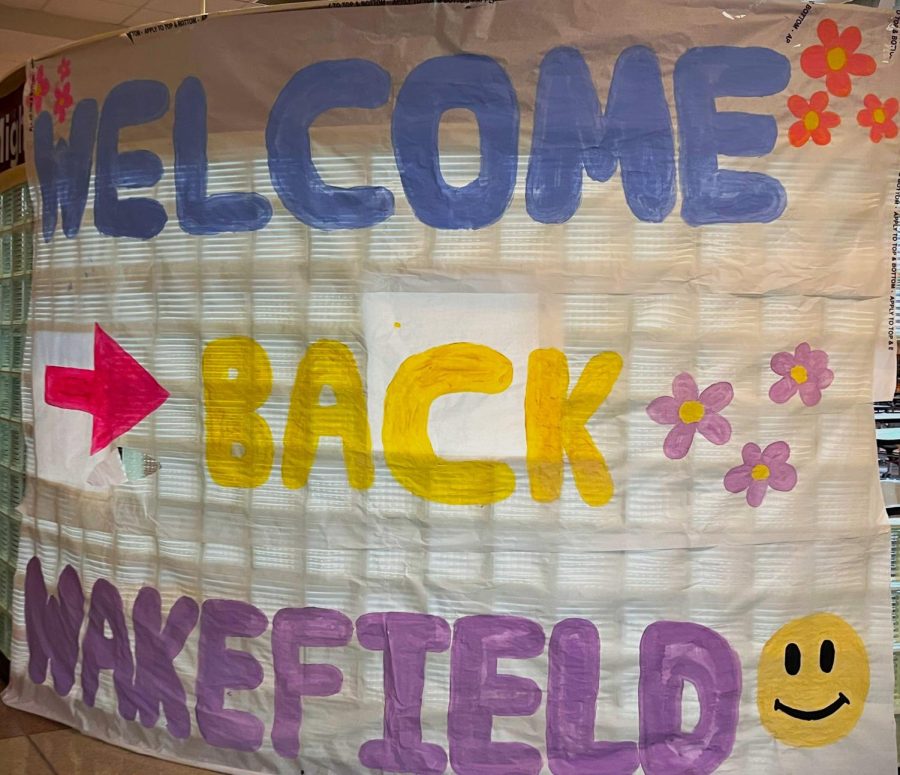A Welcome Back Wakefield sign created by student council brightens up the school entrance.  Signs like these greeted students upon arrival to the school this year.