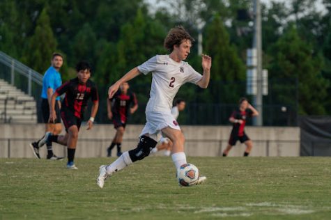 On September 19, the Wakefield soccer team played against Rolesville. During the game, Xander Luzniak brought the ball down the field. 