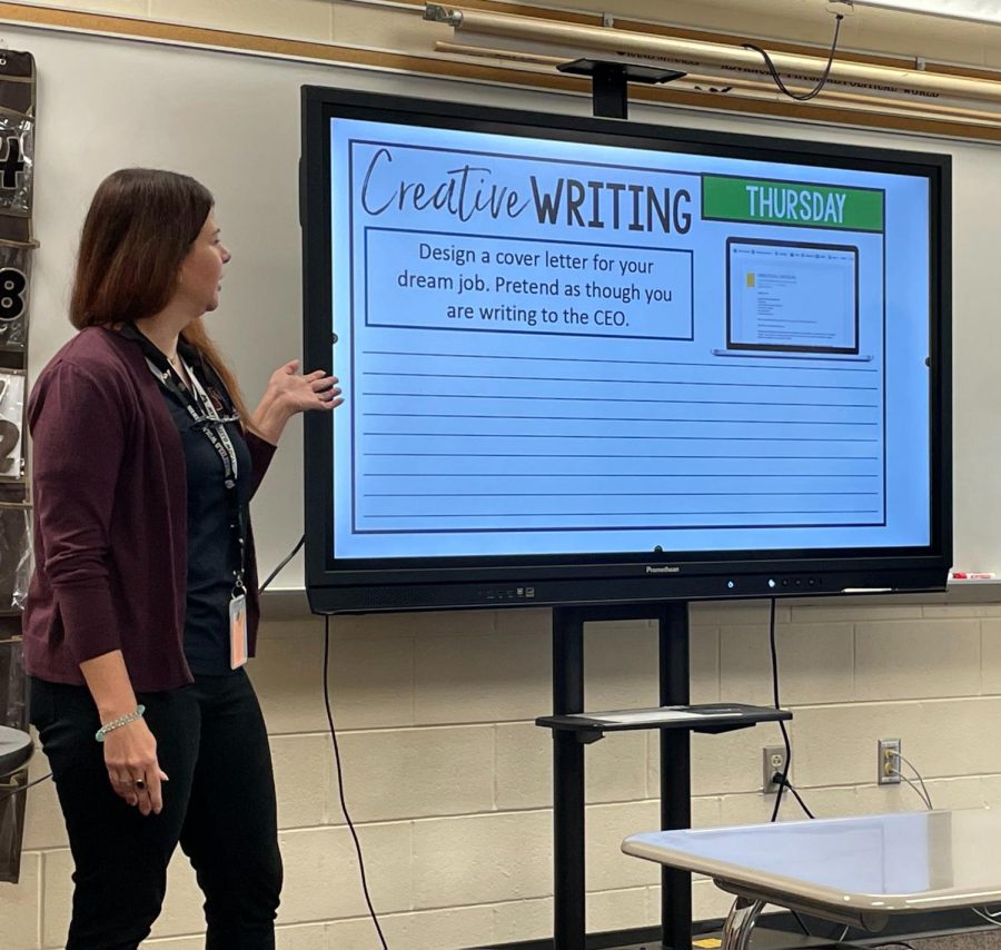 Plunkett teaches her third period a creative writing assignment. Plunkett is a special education teacher who strives for student success.