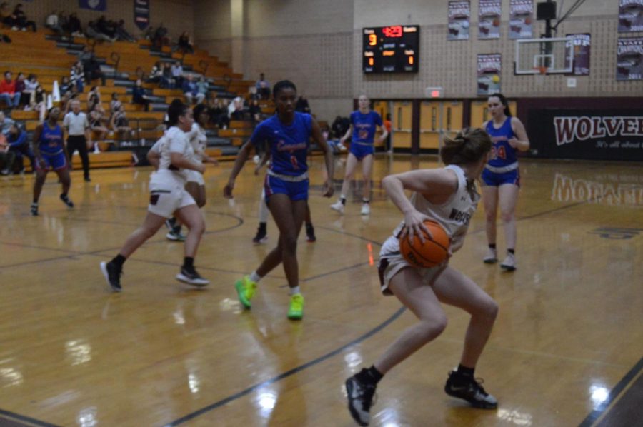 Lyla Bagwell, freshman makes a pass in a game against the Wake Forest Cougars. The final score was 50-32.