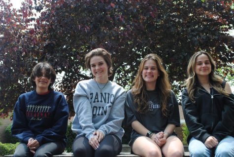 Howler seniors, Max Rubino, Sophia Fisher, Millie Monahan and Abby Dykes share a moment together on campus.