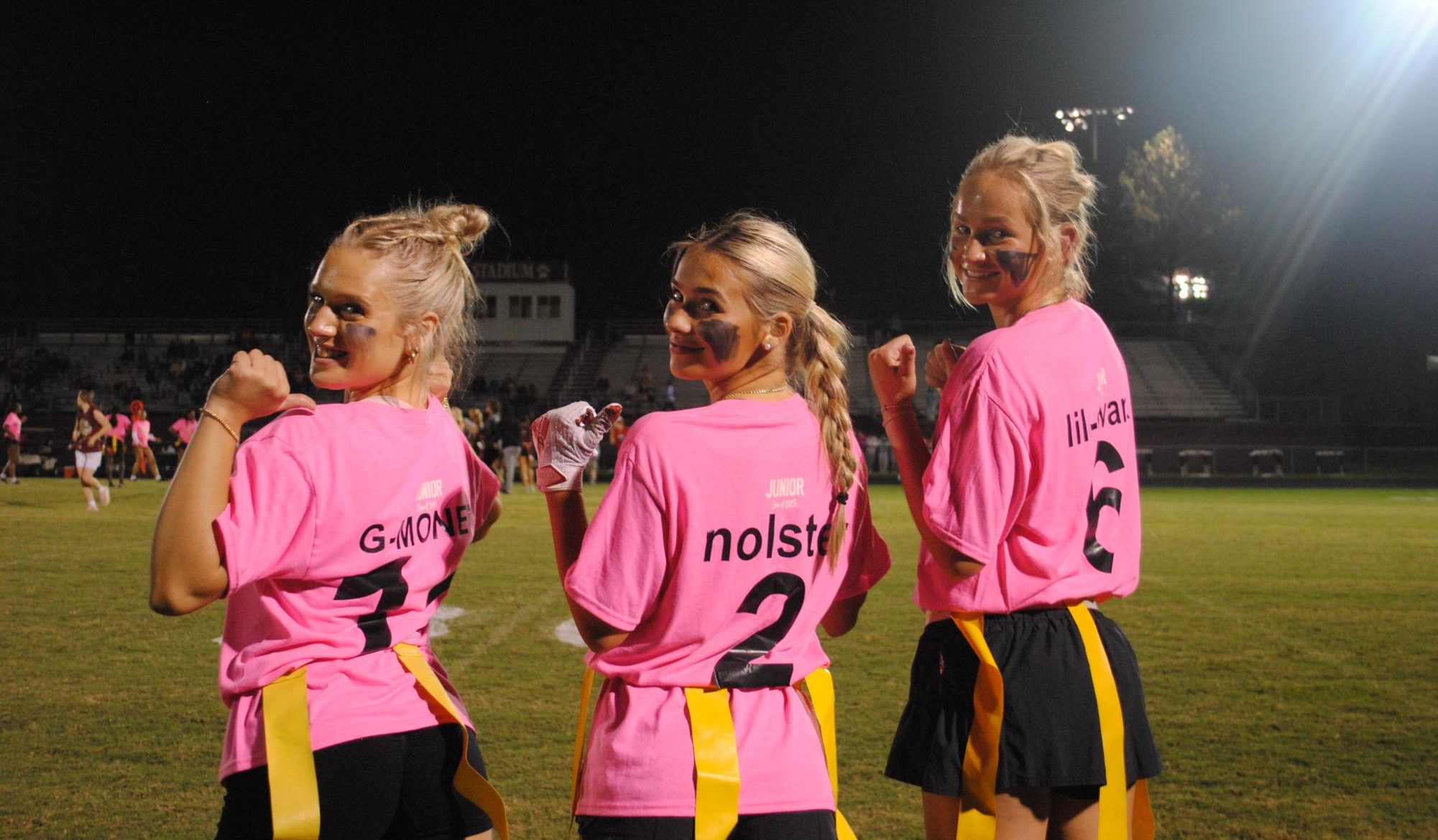 Three Juniors proudly stand on the field for last nights Powderpuff game. The Juniors faced the Seniors and the Freshmen faced the Sophomores in two epic forty minute games.