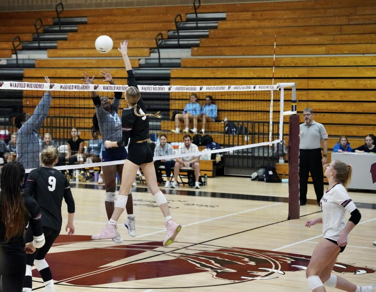 The Lady Wolverines display their strong defensive capabilities in their September 26 game against Millbrook High School. The girls embrace the opportunity to compete against strong opponents, and have high hopes going into the rest of their conference plays.