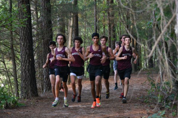 Wakefield cross-country competes at Ravenscroft for the fall season. Many runners would achieve new personal records in this race. (Photo Courtesy of Wakefield Cross Country Team)