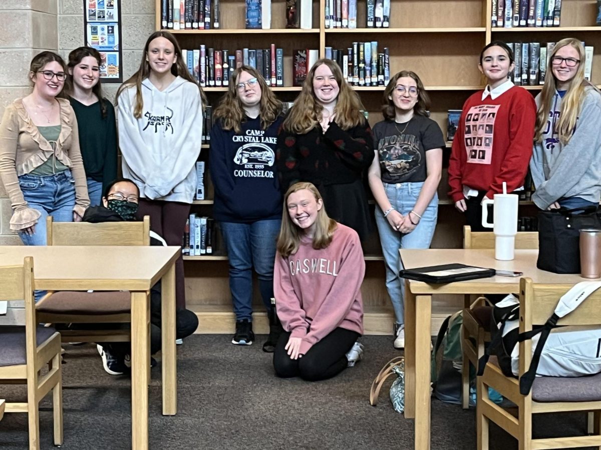 The creative writing club meets in the library. The club practices writing and diligence in preparation of a career in authorship.