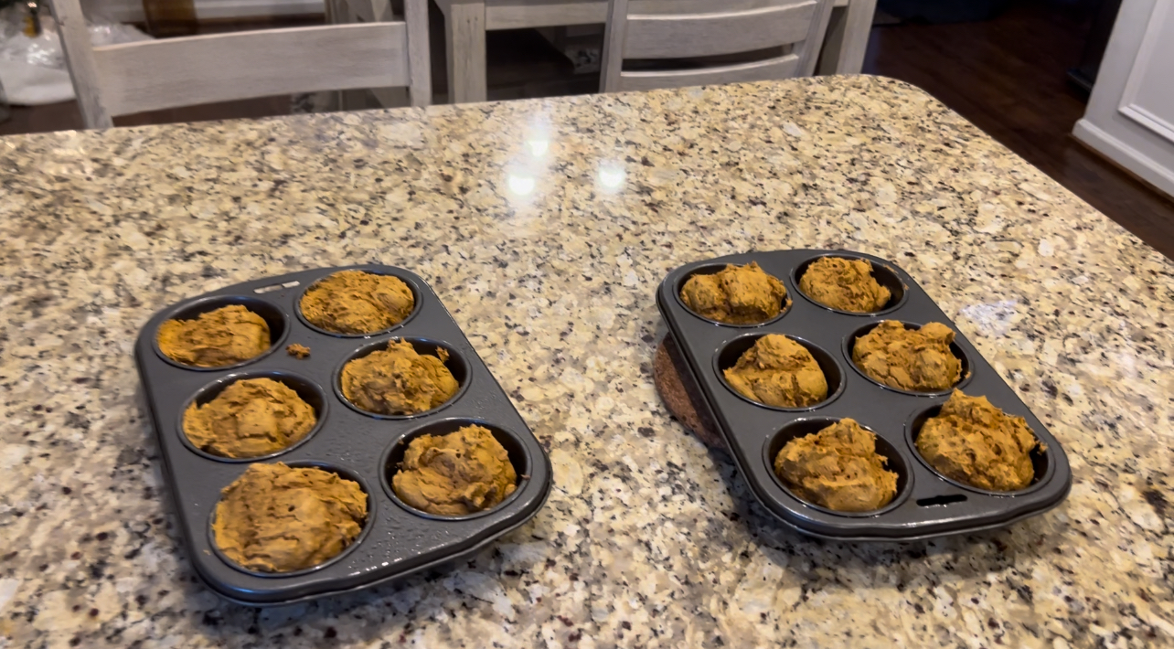 A display of pumpkin spice muffins in a pan is shown. These muffins are great to make during the fall season!