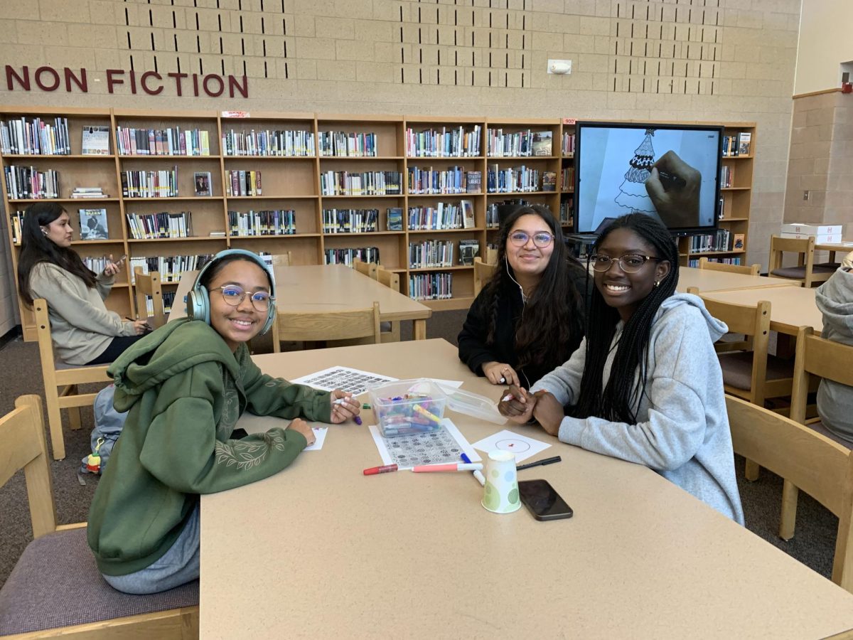 Students participate in Zentangle activities in the media center. Not only can they exercise creativity, they also get to hang out with friends.