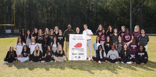 The Wakefield sports medicine team poses for a photo after being awarded the Safe Sports School Award. The award recognizes the hard work the students have put into the program.