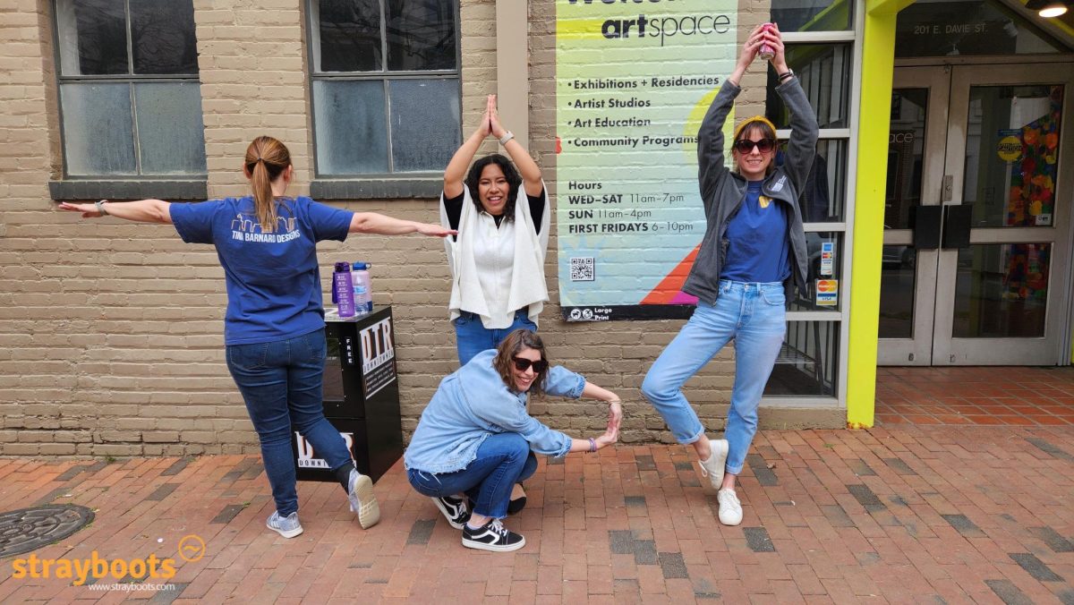 A group poses in front of Artspace as part of their scavenger hunt. These hunts help to promote team bonding and enable people to learn more about their city. Photo Courtesy of Strayboots. 
