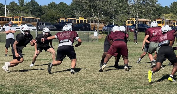 Varsity Football prepares to go for the victory out on the field for the big homecoming game! The game will be on October 11th!