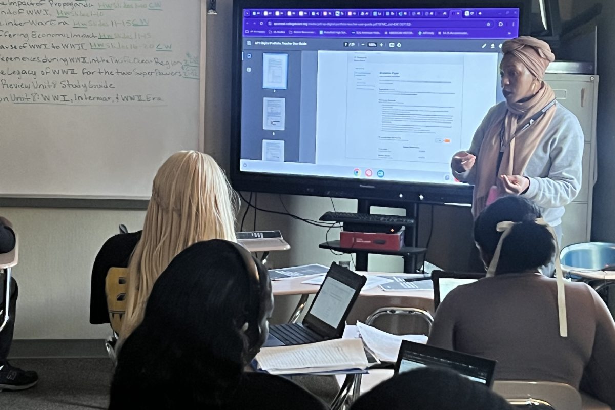 Moss instructs her AP African American History class. She guides them through every step of their project and is ready to answer any questions they may have. 