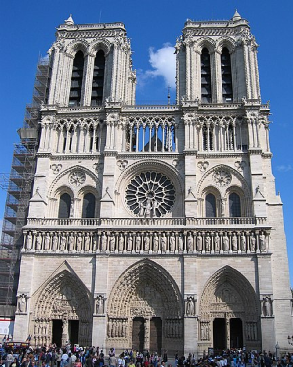 Notre Dame before the fire, fully operational. This photo displays the famous pillars, rose window, and just how many people go to see it. (Photo courtesy of Christopher Kramer via wikimedia commons)