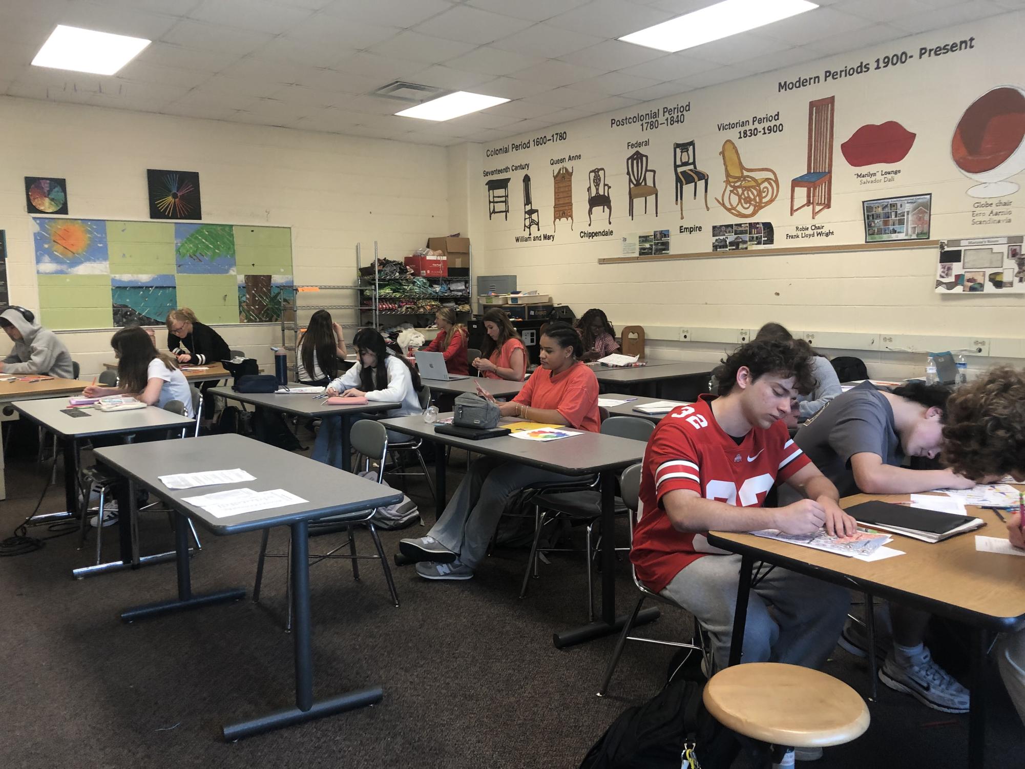 Students use coloring sheets to learn the basics of color theory in Jane Flanagan's Interior Design Fundamentals class.